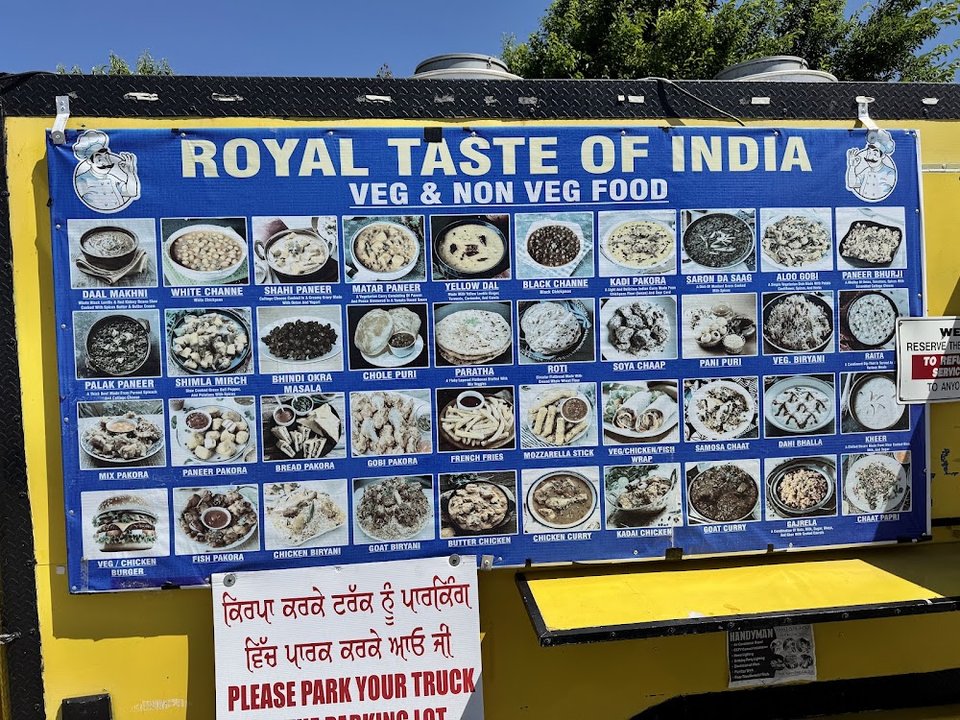 Printed menu with vegetarian and vegan choices.